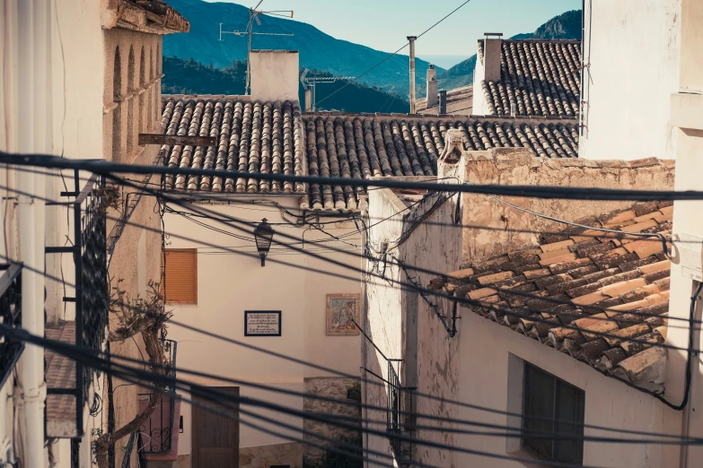 a view down on the mountains and buildings