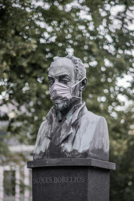 a statue with an oxygen mask on it