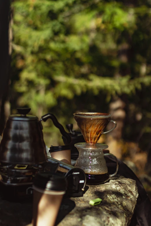 a coffee pot filled with syrup being poured into it