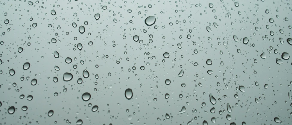 the water droplets on the windows are reflecting off the window