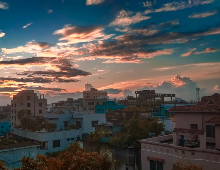 the view from the roof of a building at dusk