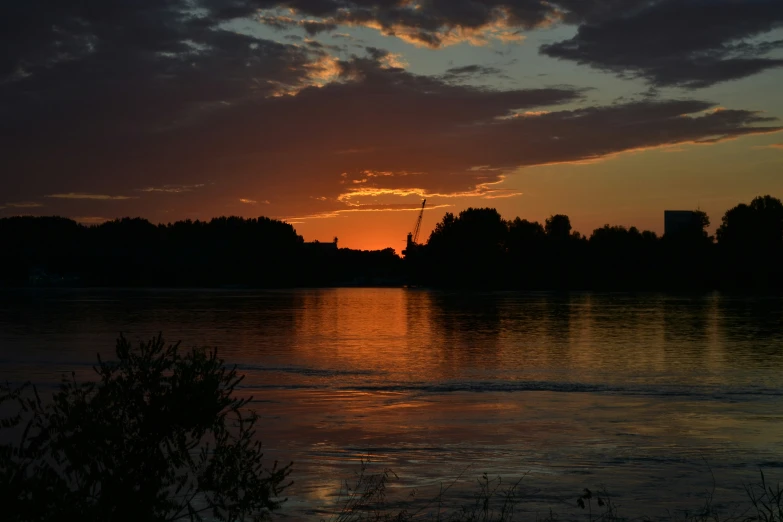 sunset reflecting off the water as seen from a boat