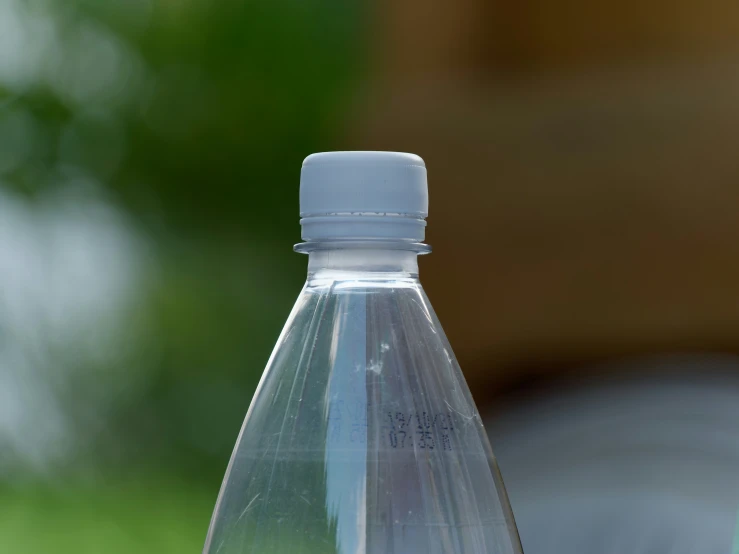 the water bottle is filled with clear, liquid