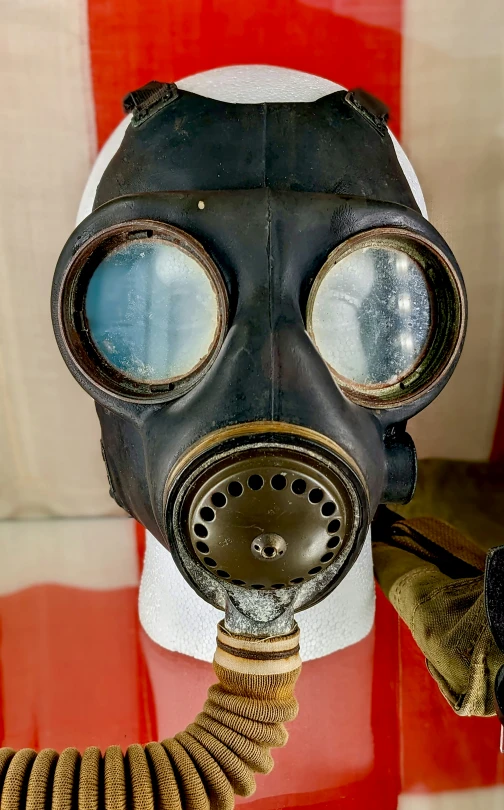 a gas mask and mask cleaner on display