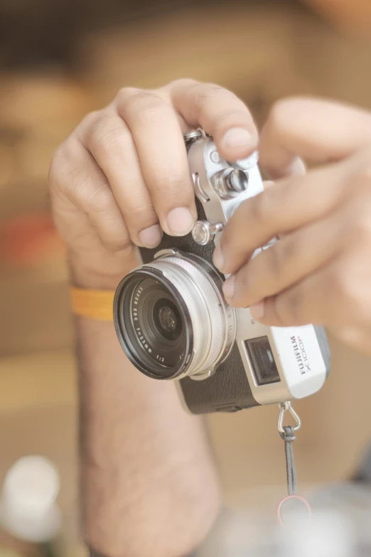 the person is taking a picture with his camera