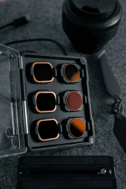 a drawer containing makeup brushes and mirror