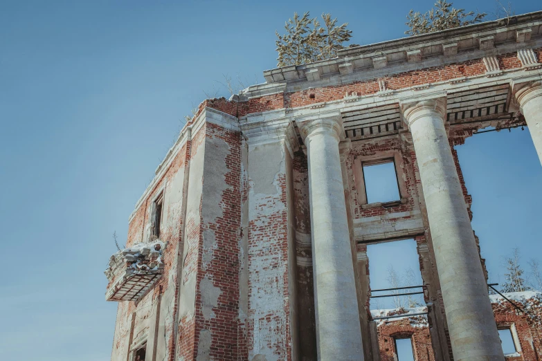 the structure of an old brick building with multiple windows