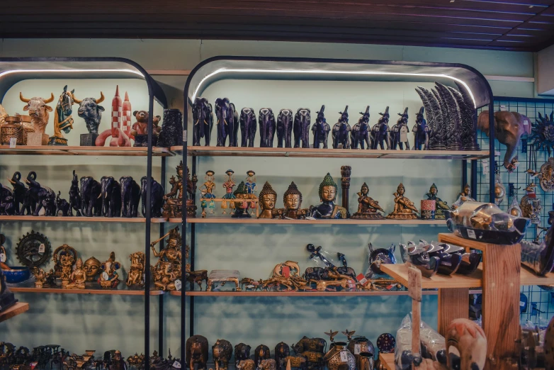 a big display of figurines and glass objects