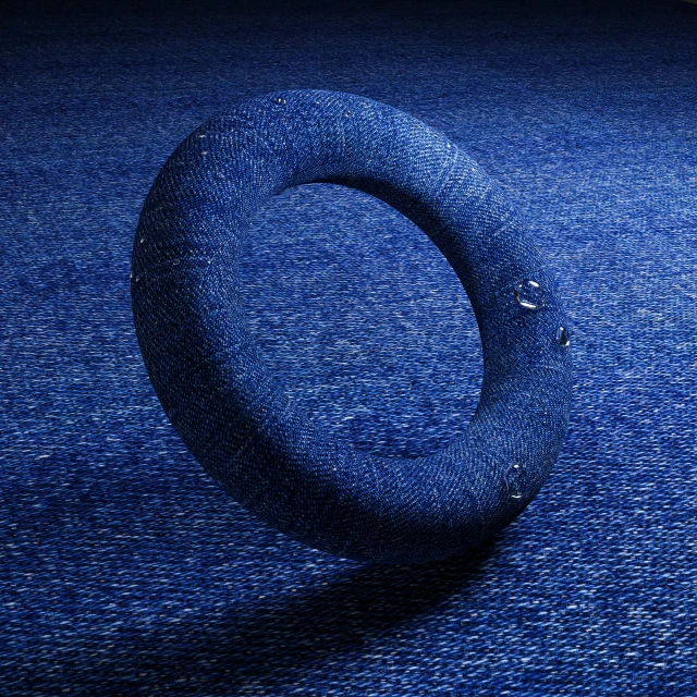 the circular object is against the blue backdrop
