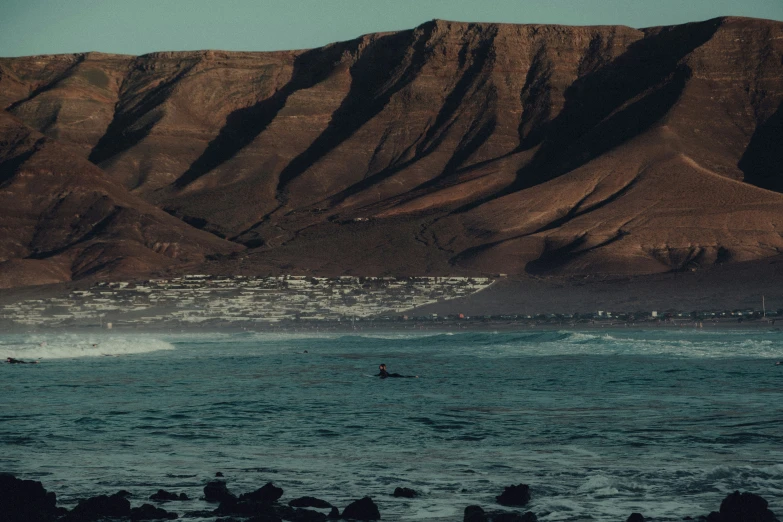 a beach with a couple of surf boards