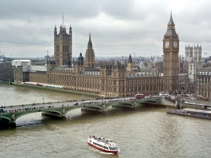 the london skyline can be seen on a cloudy day