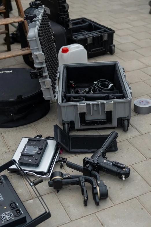 some tools that are on the ground in a case