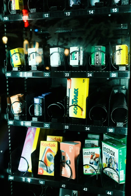 many boxes of tea and teabags on display in the store