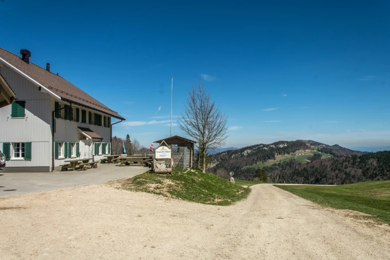 a picture of some buildings in the mountains