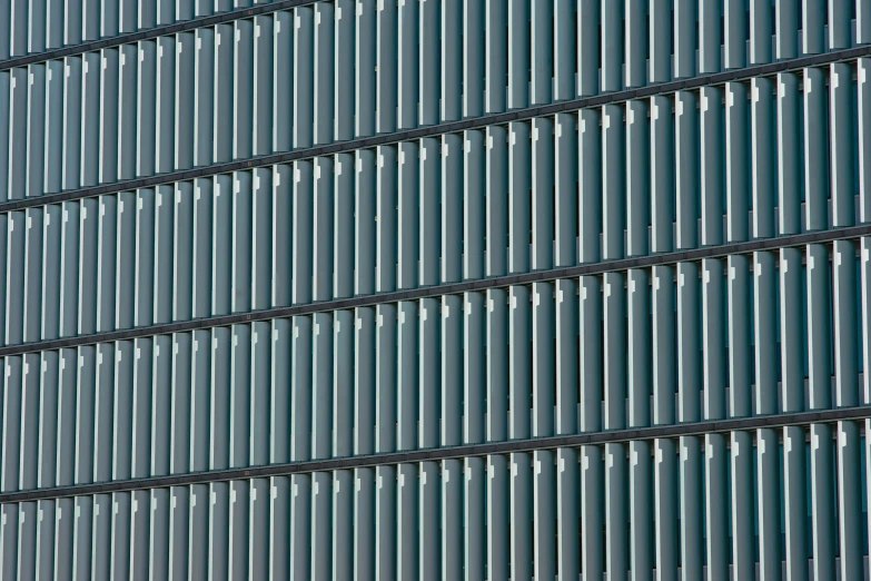 the facade of a tall building that has lines drawn on it