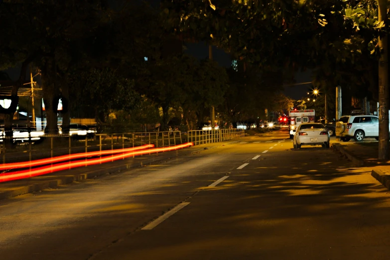 a red line on the street next to the road