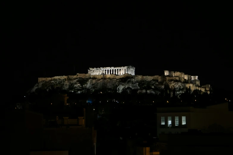 some buildings that are on top of a mountain