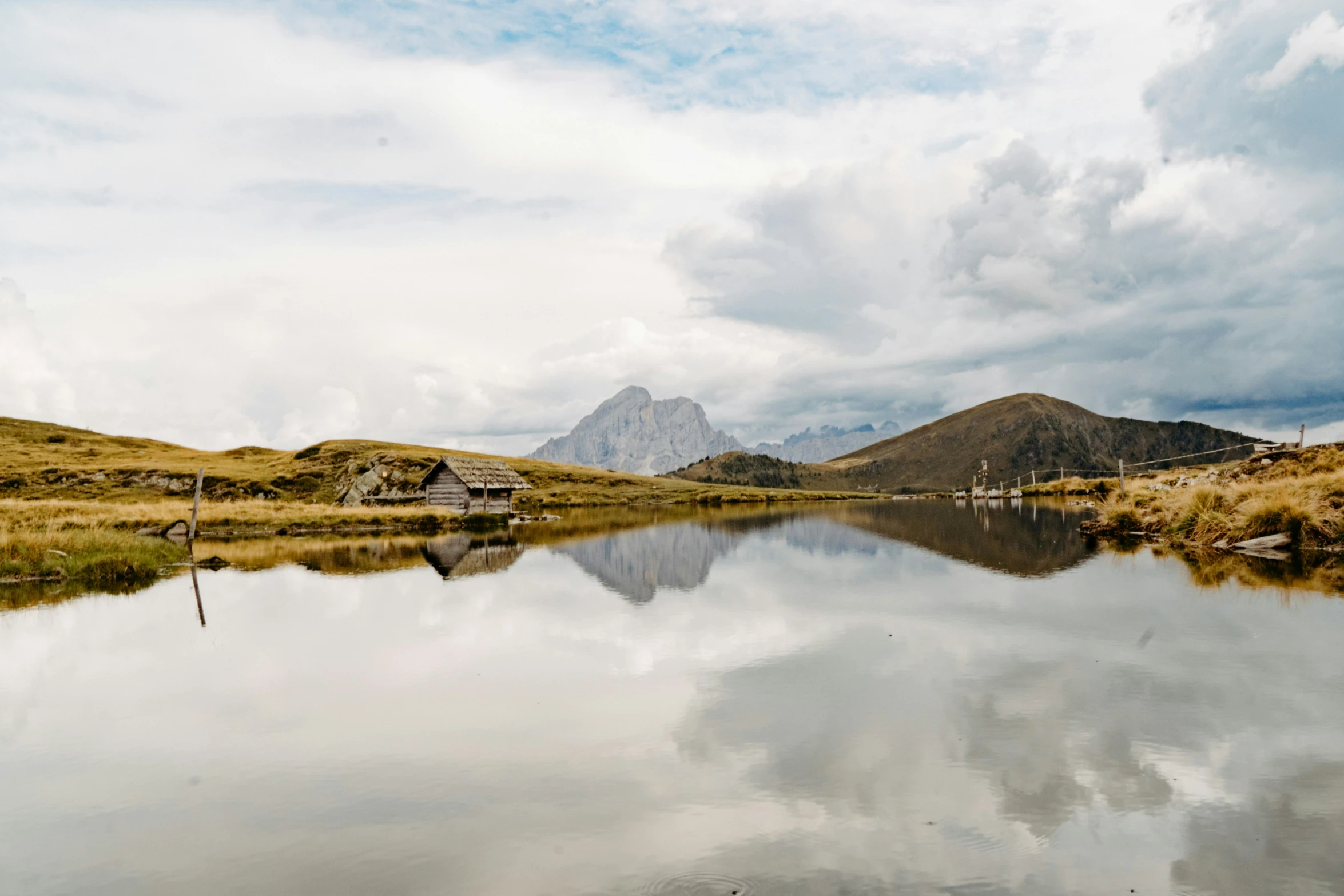 a pond with many reflections in the water