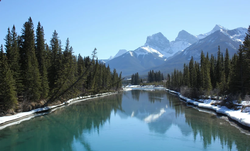 a view of a placid, still cold river