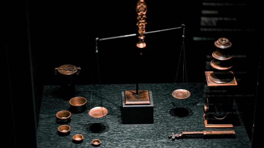 a display with wooden objects and small pieces