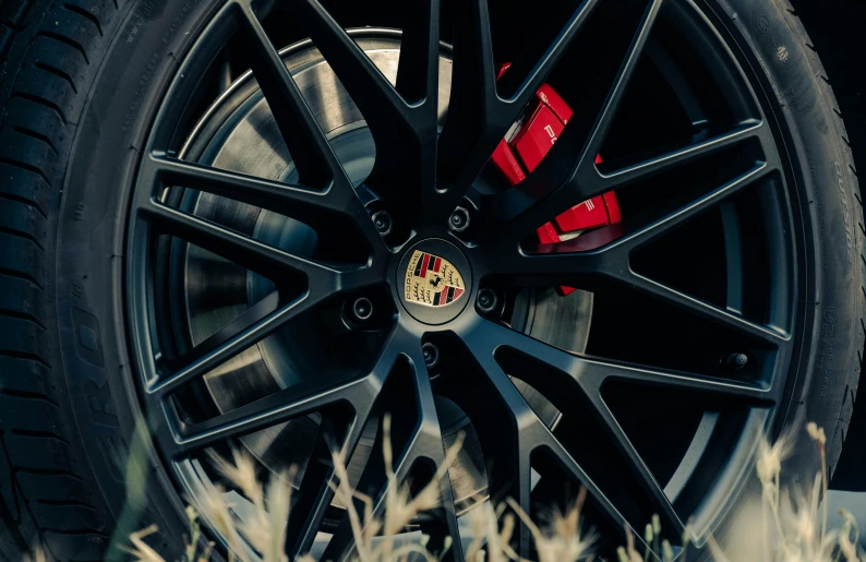 the tire wheel and tire rim of a porsche car