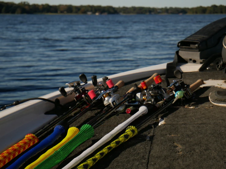 an arrangement of fishing rods and poles on a boat