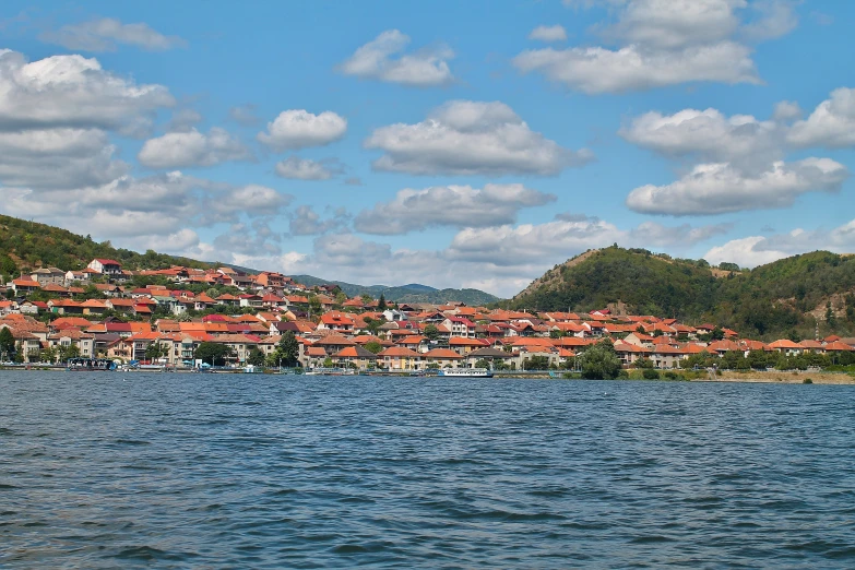 a beautiful view of houses on top of a hill