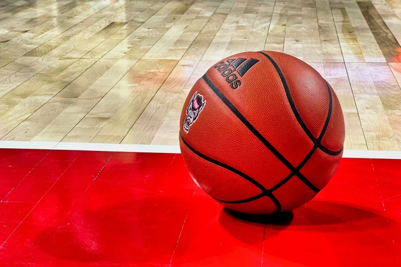 a close up of an basketball on a court