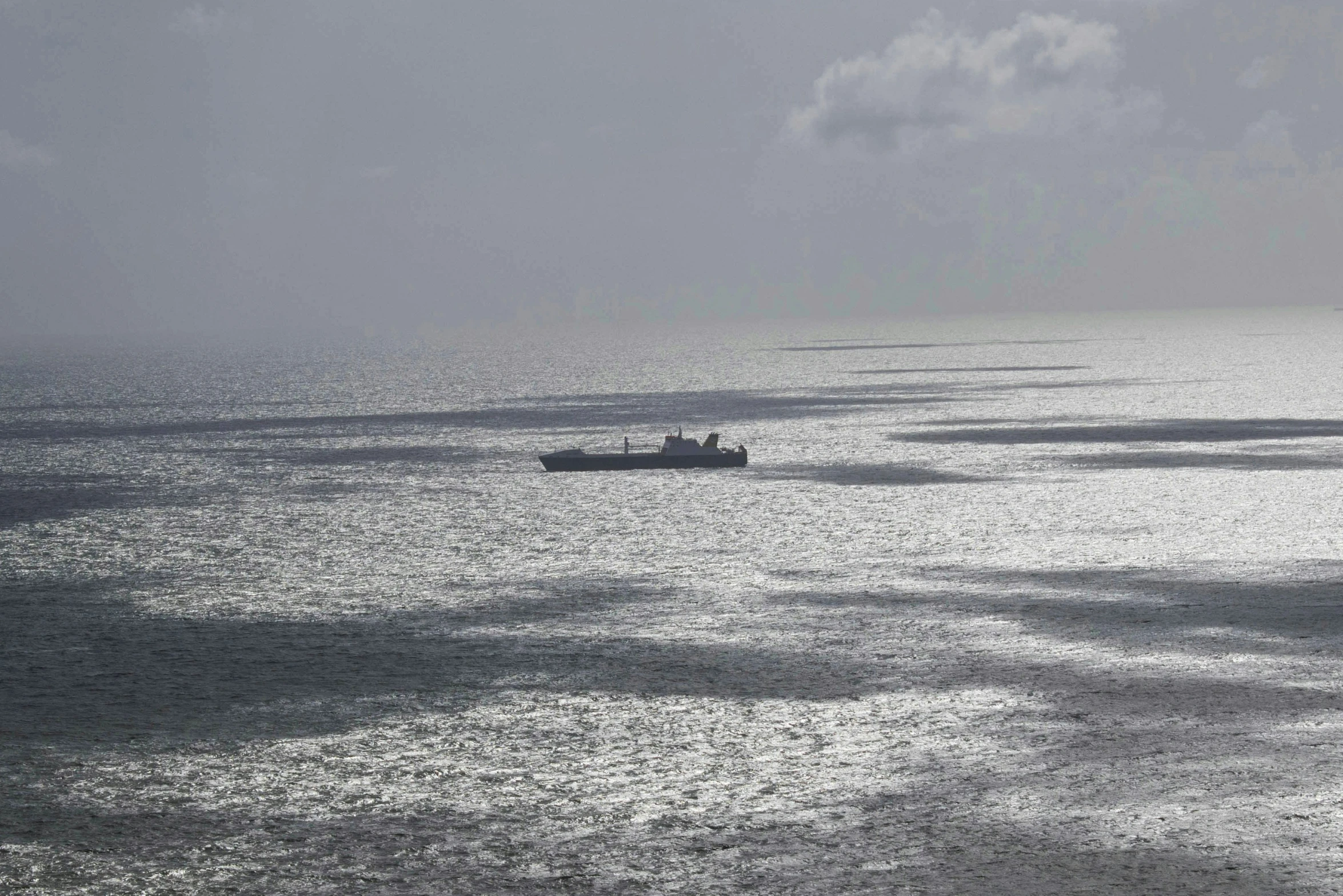 a couple of ships in the open water