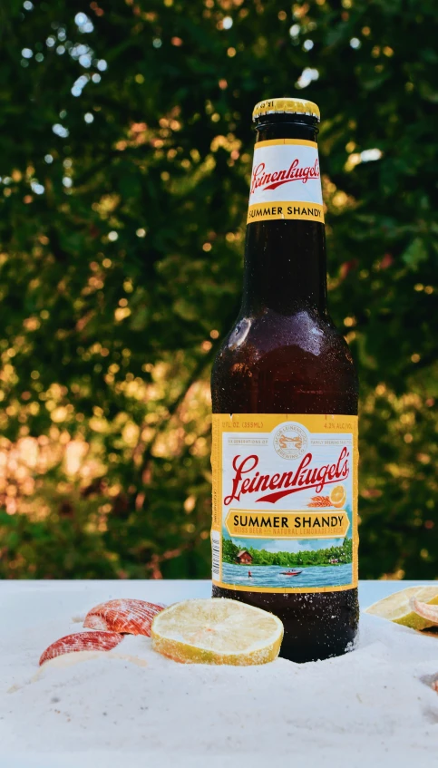 a bottle of beer sitting on top of a table