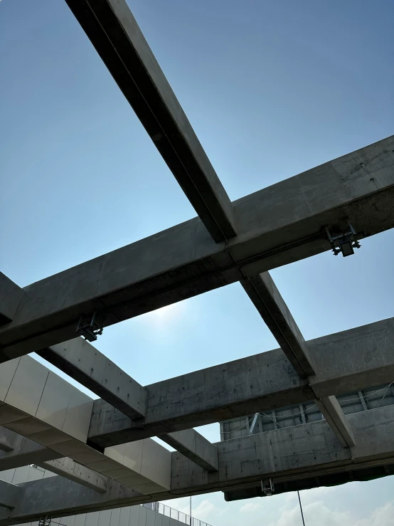 the view up at a steel structure in an industrial area