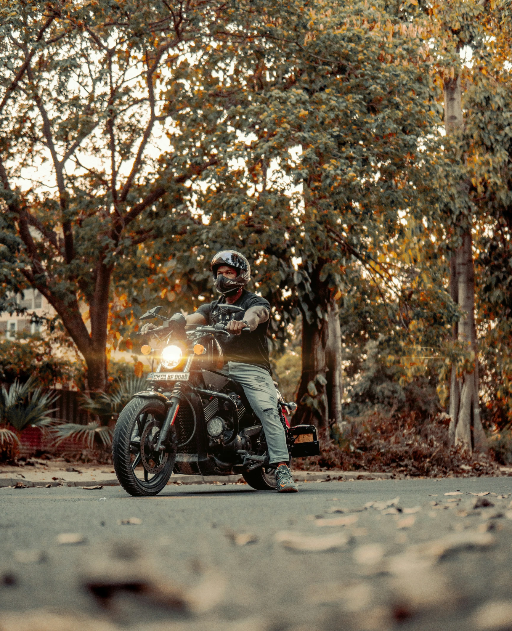 the rider is riding the motorcycle on the road