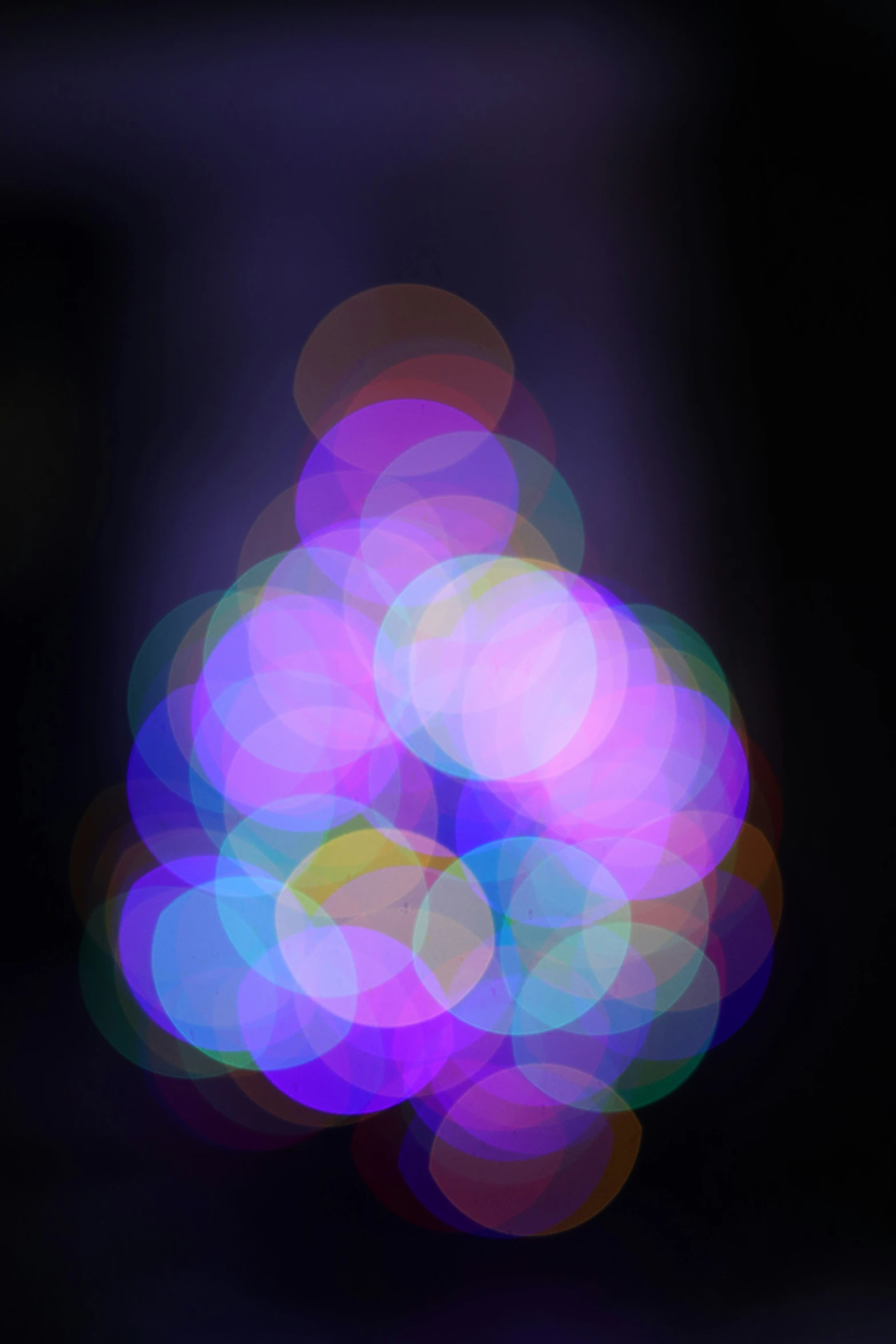 the blurred circles are brightly colored in the dark