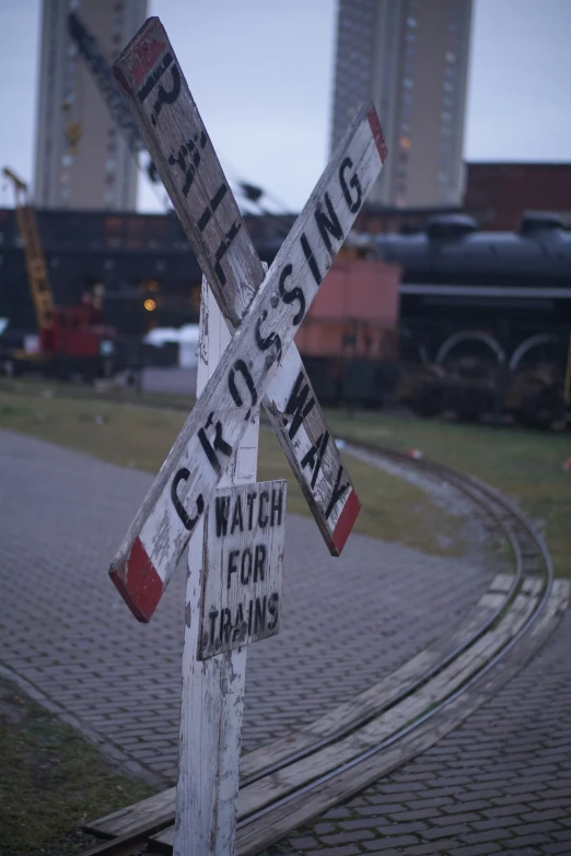 a train yard crossing sign with no crossing signs on top