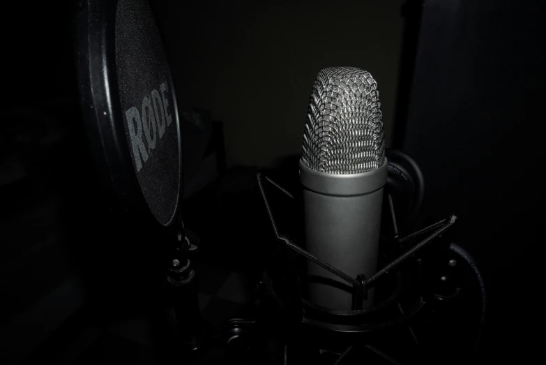 there is a black microphone in this studio po