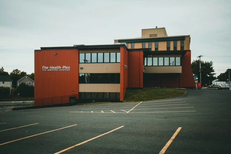 a large red building with a lot of windows