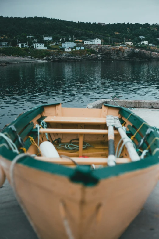 a wooden boat sitting on top of the water