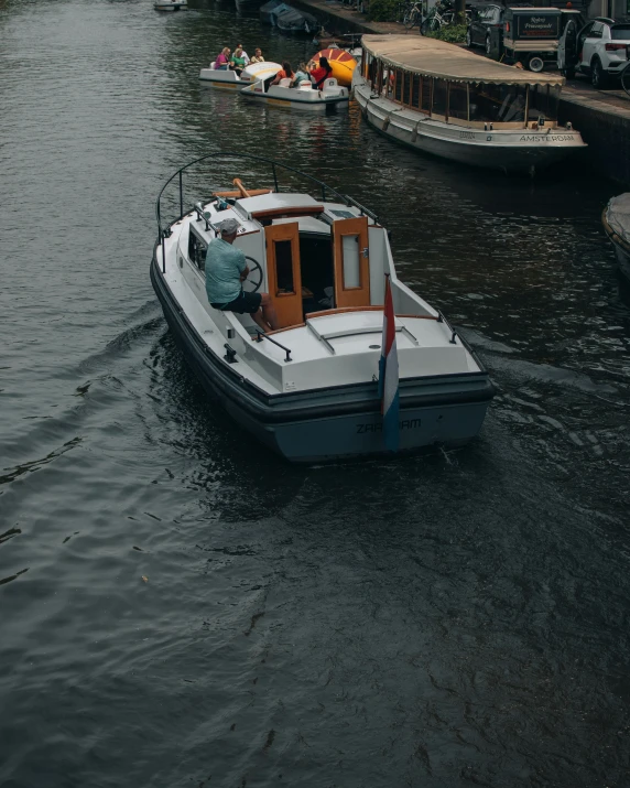 there is a small boat floating in the water