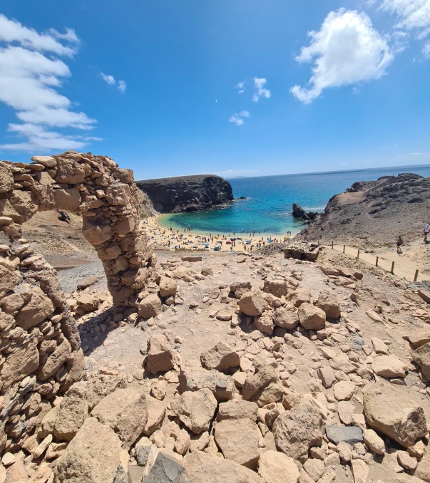 the ruins are set next to the ocean water