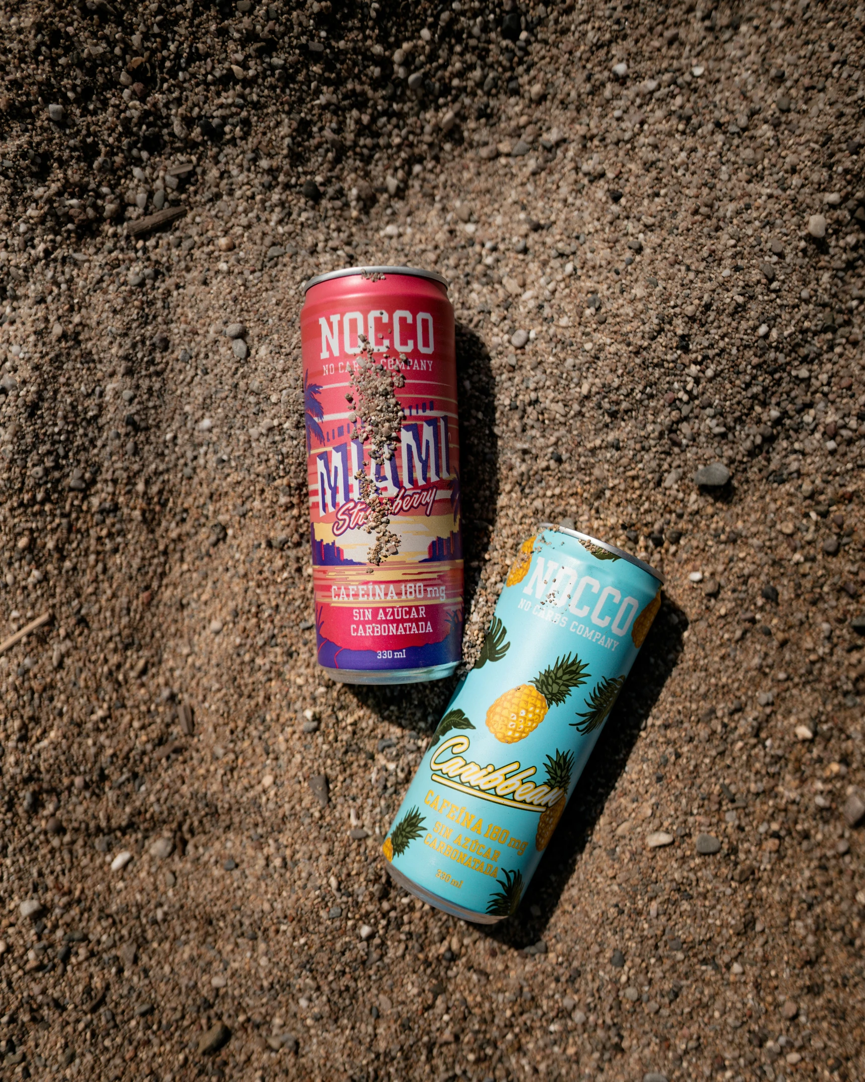 a can of nectar on the ground next to a can of nectar