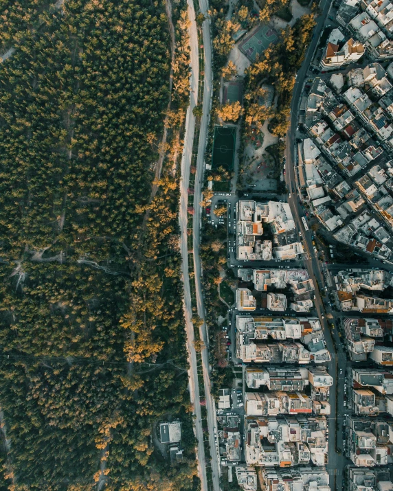 aerial view of houses near an elevated road