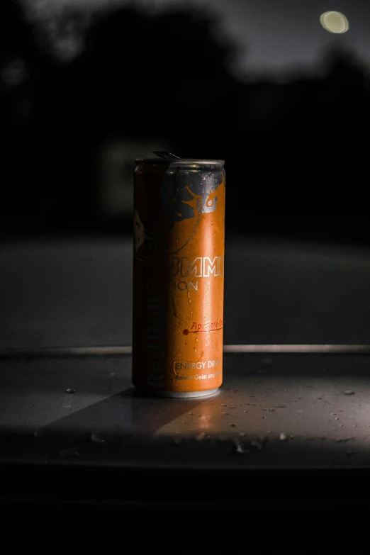 an image of an orange can on the floor