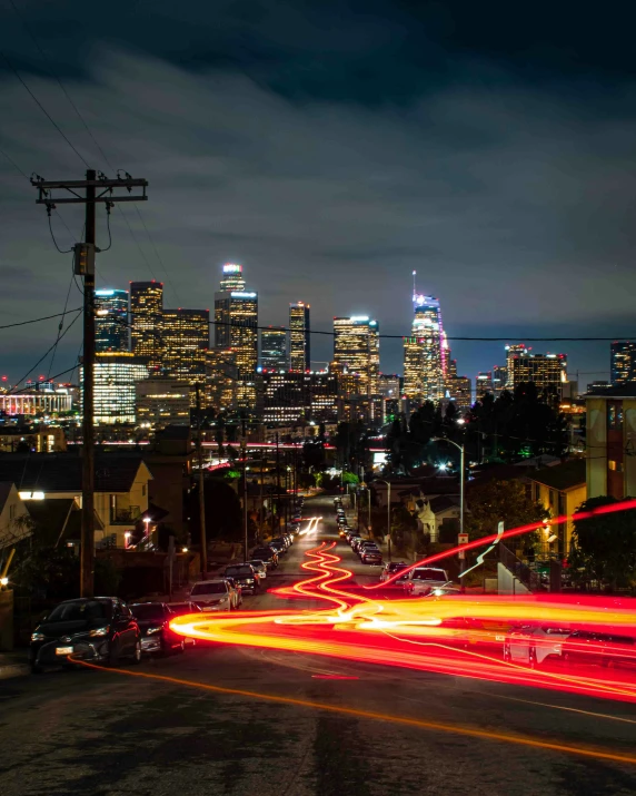 a city filled with tall buildings surrounded by traffic