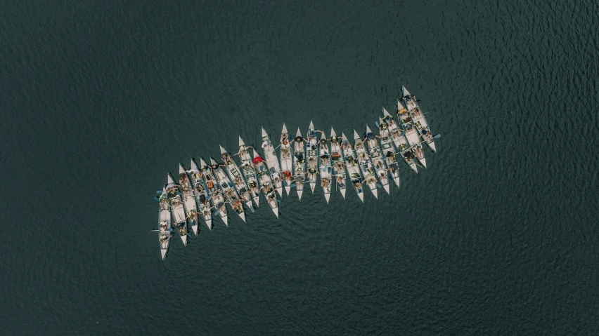 boats are floating in a body of water