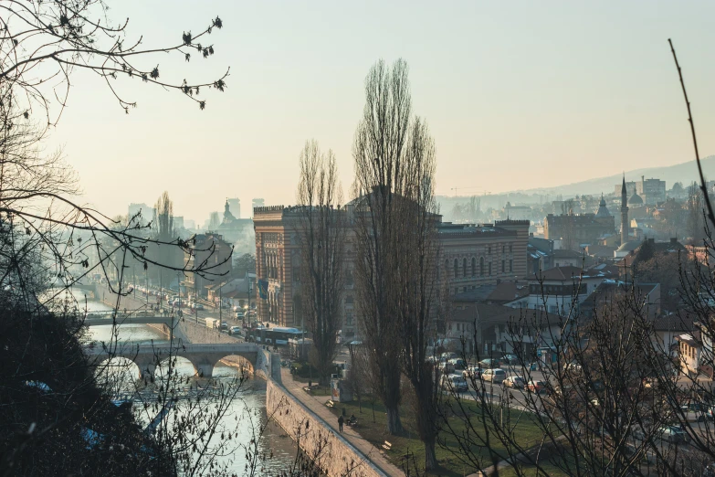 a view of a city in the evening light