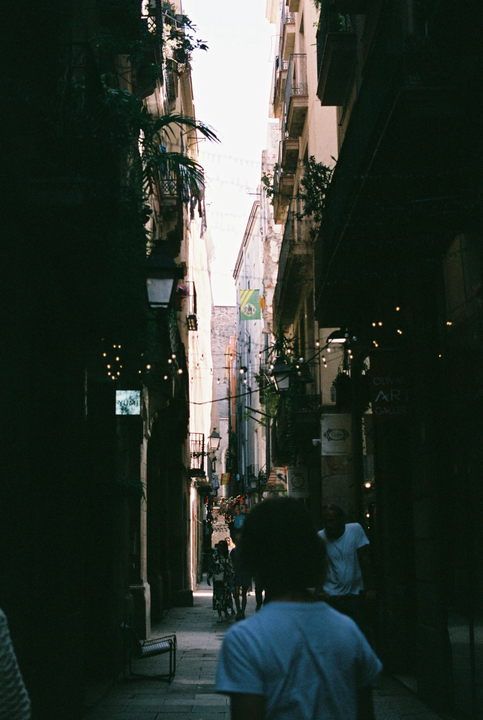 this is an image of a narrow street in a town