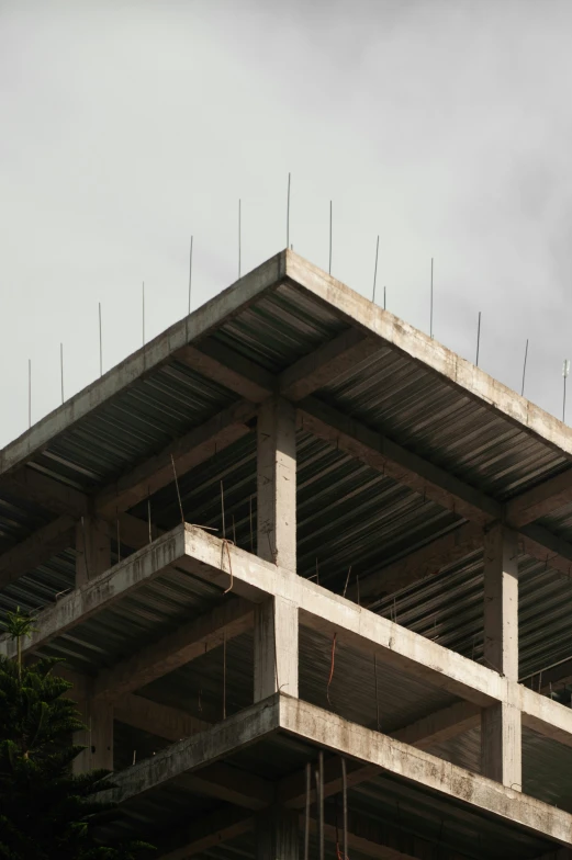 the top half of a building with many different metal bars