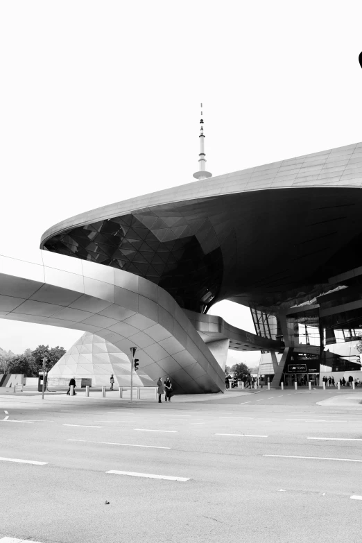 black and white po of a building with a large section of roof