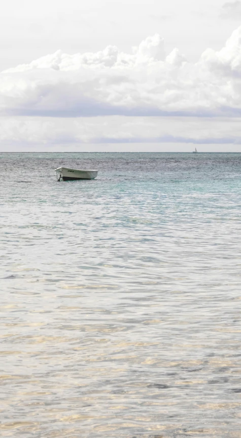 two boats out on the open ocean water