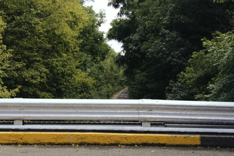 a fence on the side of a road